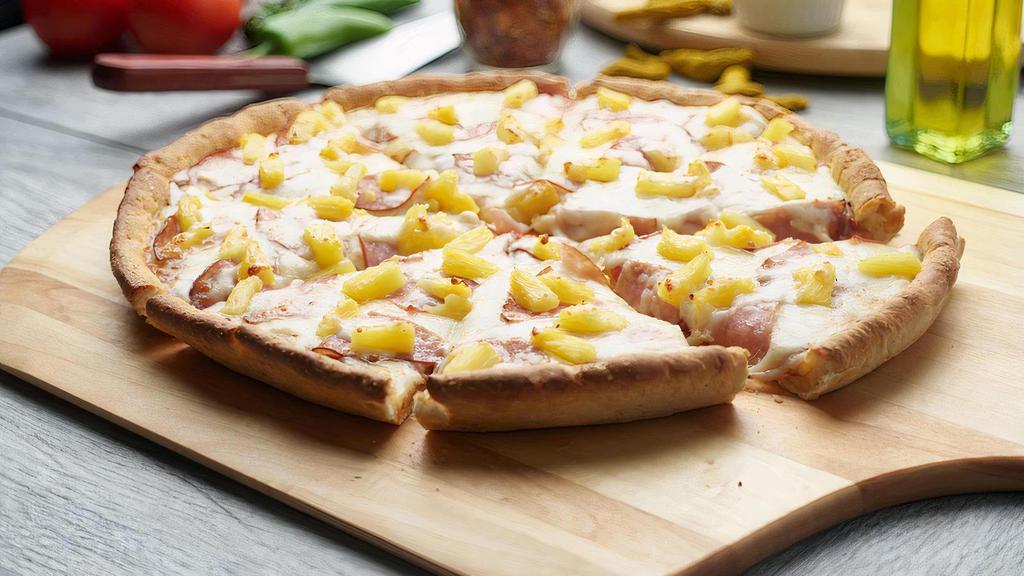 Hawaiian Pizza · This pizza has our signature red sauce, fresh diced mozzarella cheese, sliced Canadian bacon, and juicy pineapple