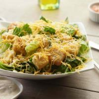 Caesar Salad · This salad has fresh crisp romaine lettuce, crunchy croutons, grated parmesan cheese and our...