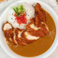 Chicken Curry · Japanese curry with rice and panko chicken: garnished with pickled daikon & scallions.