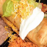 # Chimichanga · Fried burrito, chicken or beef with rice and beans.