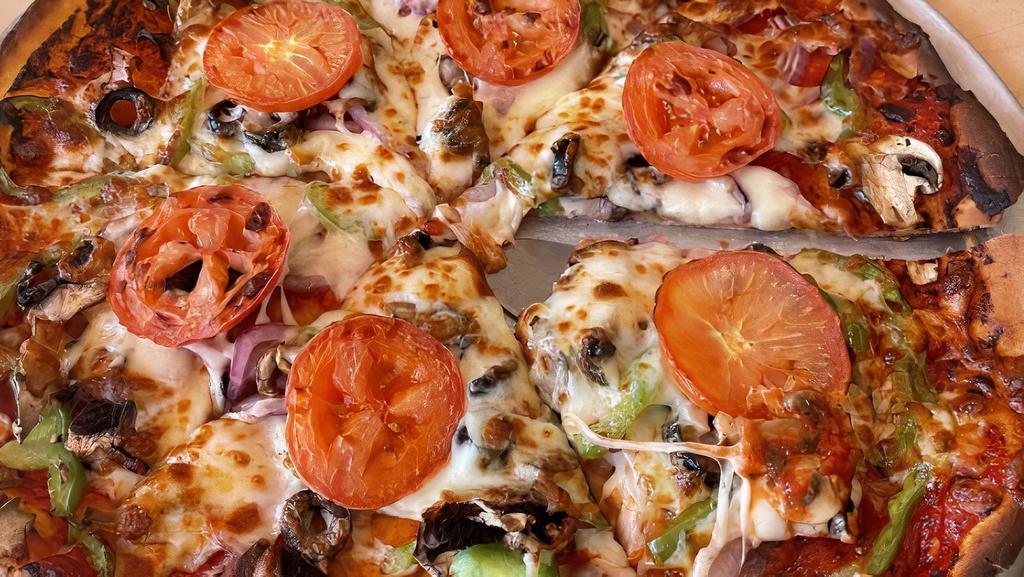 Vegetariana Pizza - X-Large 18Inches (12 Slices) · Tomatoes, mushrooms, green peppers, black olives, onions, and mozzarella.