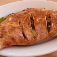 Verona'S Special Calzone · Pepperoni, Canadian bacon, mushrooms, and black olives.