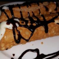 Chocolate Cannoli · Tube-shaped shell of pastry dough filled with a delicious creamy filling.