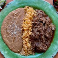 #17 Beef Barbacoa Plate · Beef barbacoa with pico de gallo and cabbage on a plate with rice and beans.