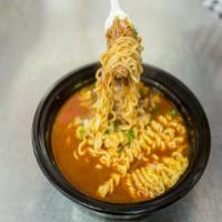 Ramen Birria · Ramen Noodles, with Birria and Broth(Consume). Comes with a side of Cilantro, red onions and...