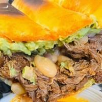 Torta · meat, cheese,beans,onions, cilantro and avocado