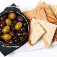 Artisan Olives · House-marinated olives and freshly baked breads.