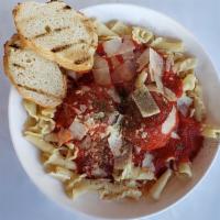 Pasta And Meatballs · Classic pasta and meatballs, with marinara sauce and shaved parmesan, served with crostini.