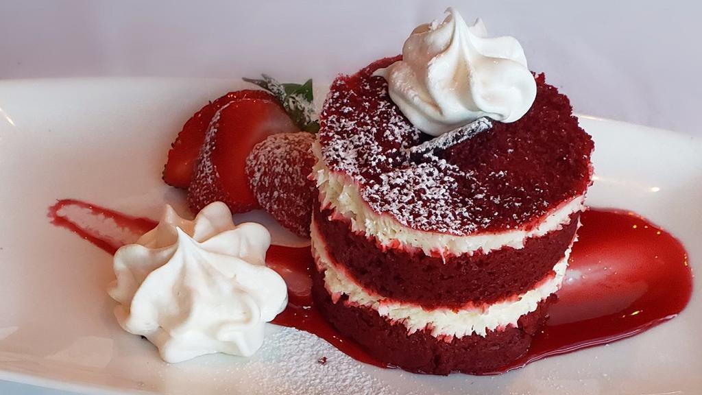 Red Velvet Layer Cake · Layered with cream cheese frosting and topped with fresh whipped cream