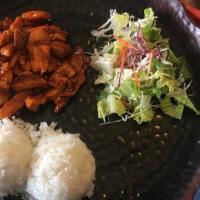 Spicy Chicken Teriyaki · Marinated chicken with spicy sauce, grilled, served with rice and salad. Served spicy.