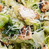 Classic Caesar · Romain lettuce hearts, with croutons, shredded parmesan cheese and Caesar dressing
