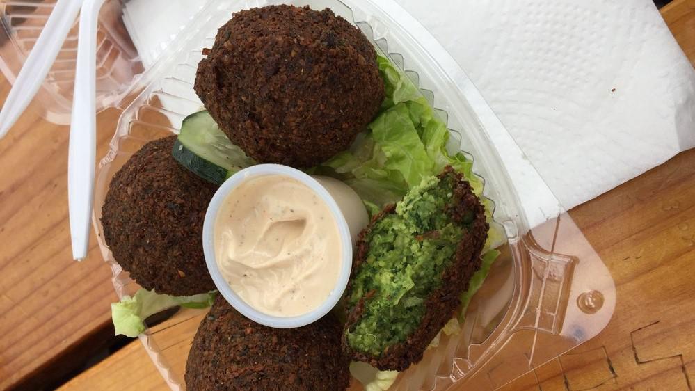 Falafel · Fava and garbanzo beans, onion, parsley cilantro, and spices deep fried to order.