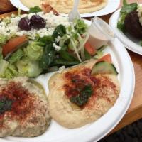 Vegetarian Mezza · Hummus, baba ganoush, falafel, dolmas, Greek salad.