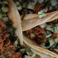 Taco Plate · Two tacos served with rice, beans, and your choice of meat.