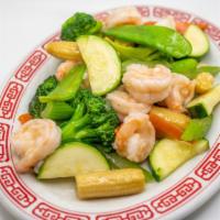 Shrimp With Vegetables · Lightly battered shrimp with Chinese vegetables and a white wine sauce. Served with white ri...