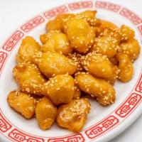 Sesame Chicken · Chicken with sesame sauce and sesame seeds. Served with white rice and a fortune cookie.
