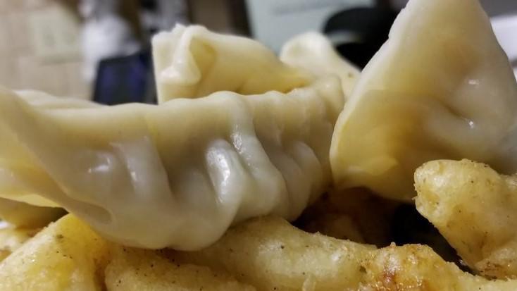 Pot Stickers · Six pieces. Served with our house made pot stickers sauce.