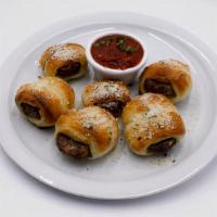 Meatball Stuffed Knots · They're like little sliders! Finished with olive oil & fairy dust and served with marinara. ...