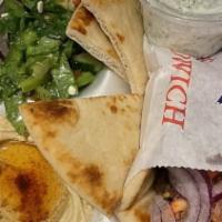 Philly Gyro Plate · Philly Gyro pita wrap (Gyro meat, grilled bell pepper, grilled onion, Swiss cheese and mayo ...