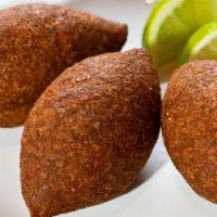 Kibbeh 3 Pc And Tzatziki Sauce. · Deep fried ball of meat(Beef) with cracked wheat, stuffed with a mixture of ground beef, oni...