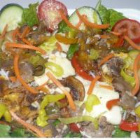 6- Philly Steak Over Salad · with veggies & American cheese.
