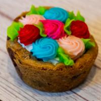 Cookie Cups · A chocolate chip cookie, baked into a cup shape, filled with frosting and decorated on top!
...