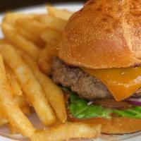 The Dwn Undr · Fresh 8 oz house made patty, lettuce, tomato, onion, and cheddar on a Macrina Sodo bun; serv...