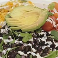 Taco Bowl · quinoa, avocado, roasted corn, black beans, tomatoes, cilantro-lime crema