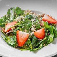 Strawberry Spinach Salad · Spinach, strawberries, candied walnuts, goat cheese, red onions, and balsamic vinaigrette