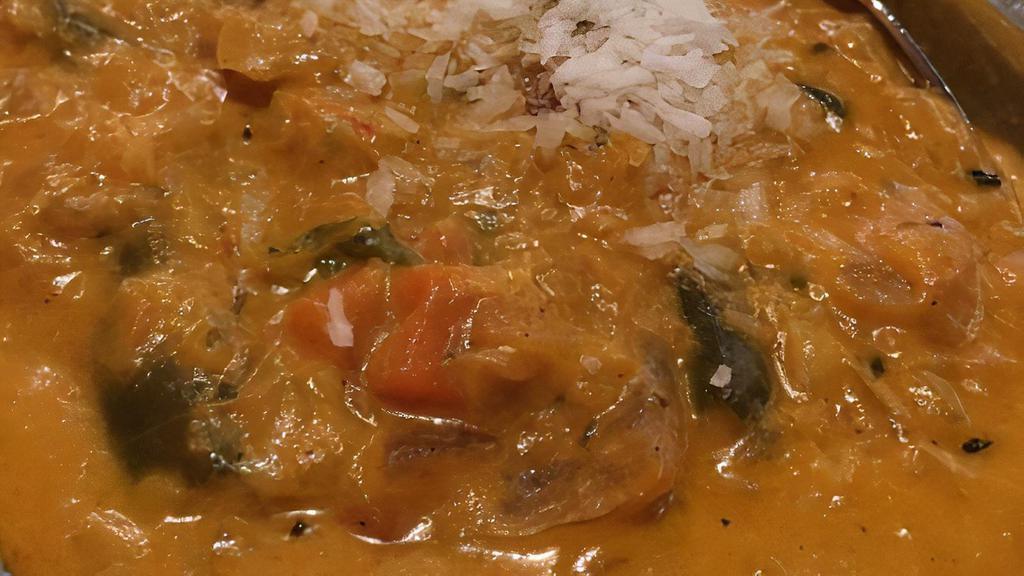 Vegetable Coconut Korma · Mixed vegetables cooked with tomato, garlic, onion, nuts, ginger, and spices.