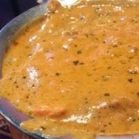 Chicken Butter · Boneless tandoori chicken cooked with cashew nuts, tomato, onion, and spices in a rich cream...