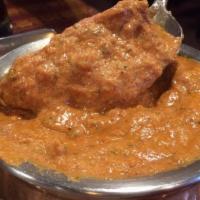 Fish Tikka Masala · Fish cooked with tomato, onion, ginger, garlic, and spices.