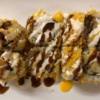 Crunch Roll · Shrimp tempura, cucumber, avocado topped with crunch tempura eight eel sauce.