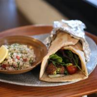 Falafel Wrap · Falafel, Hummus, Tomato, Lettuce, Pickles wrapped in a Wood Fired Pita