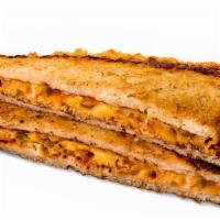 Doritos Nacho Grilled Cheese · American & Cheddar cheeses topped with crunchy Doritos Nacho Cheese chips, jalapenos, and li...