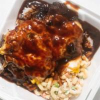 Loco Moco · 2 hamburger patties served over a bed of white rice, caramelized onions, and beef gravy, the...