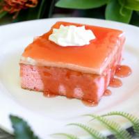 Slice Guava Cake · A sponge cake made with Guava juice, frosted with whipped cream, then topped with Guava glaze.