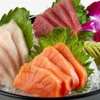 Sashimi Assortment* · Four slices each of: tuna, salmon and yellowtail; served with a bowl of rice