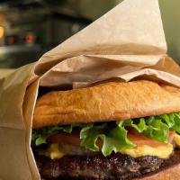 Cheese Burger · premium Oregon natural beef, lettuce, tomato, grilled onions, half-sour pickle & our housema...