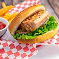 Salmon Burger · Grilled salmon, lettuce, tomato, red onion, pickles, and house sauce. Served with French fri...
