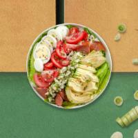 Cobb It On · Greens topped with bacon, chicken, tomatoes, cucumbers, eggs & blue cheese crumbles.