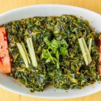 Saag Paneer · Gluten free. Classic Indian dish of cooked spinach studded with cubes of homemade cheese, th...