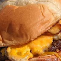 Fighter · A grilled 1/3 pound burger layered high with a fried egg and crispy bacon. Comes with your c...