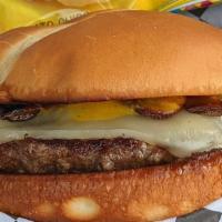 Wizard · A grilled 1/3 pound burger with melted Swiss cheese and grilled fresh mushrooms. We top it o...
