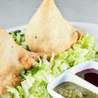 Samosas · Two crispy pastries filled with your choice of fresh mixed vegetables or delicately spiced l...
