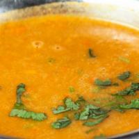 Mulligatawny Soup · Gluten free. A rich chicken, lentil and rice soup flavored with Indian spices and finished w...