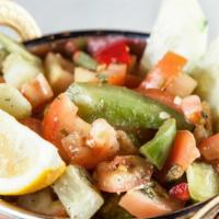 Indian Salad · Vegan, gluten free. Onions, tomatoes, cucumbers, and green bell peppers mixed in a tangy lem...