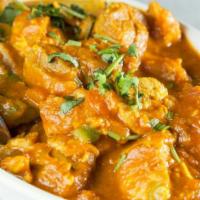 Jalfrazie · Vegan, gluten free. A rich brown curry with bell peppers, garlic, ginger, tomatoes, and onio...