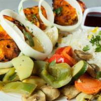 Tandoori Chicken Tikka Breast · Gluten free. Juicy spring boneless chicken breast rubbed with Indian herbs, yogurt, spices a...