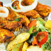 Shish Taouk · Gluten free. Boneless chicken marinated in garlic, oregano, saffron and other Middle Eastern...